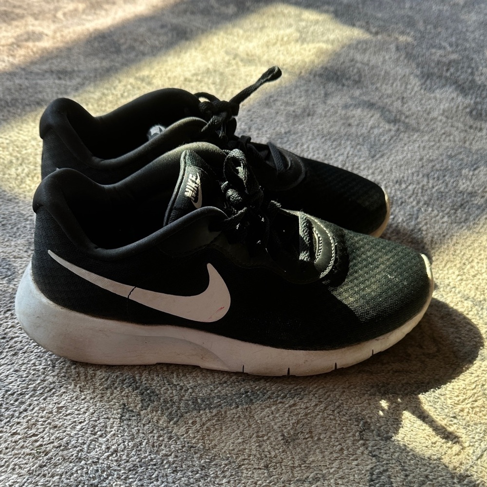 Nike Kids Black Sneakers with White Swoosh